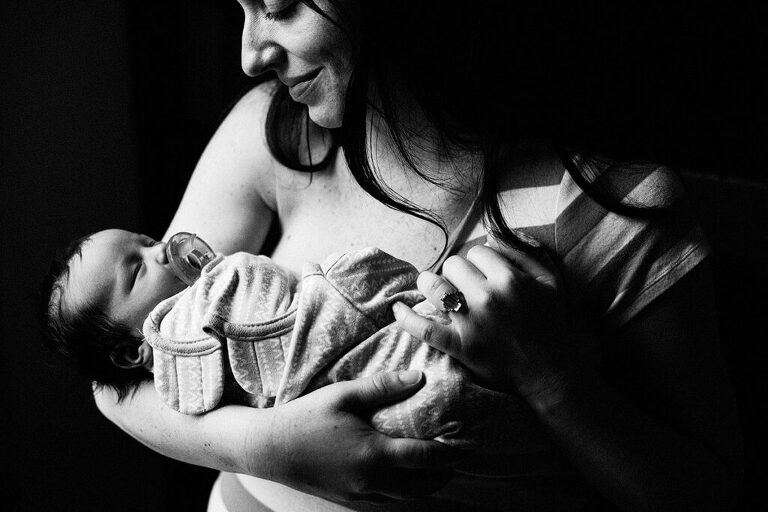 newborn in mom's arms